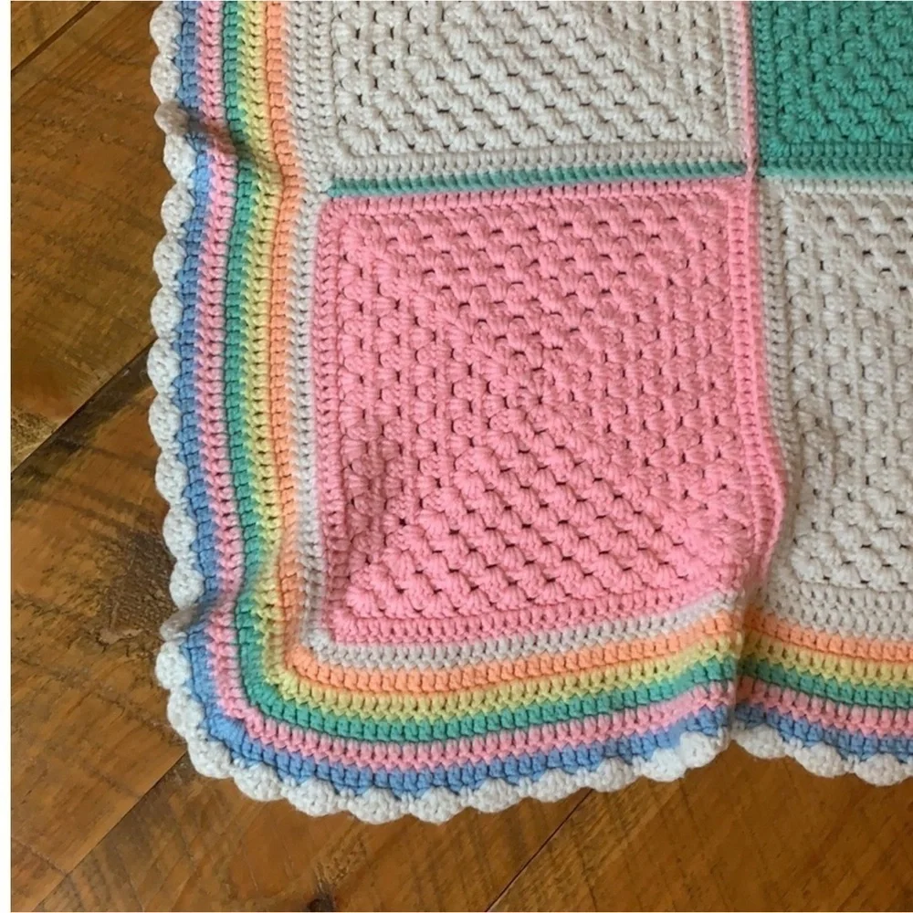 Handmade crochet baby blanket in pastel colors / colorblock pattern